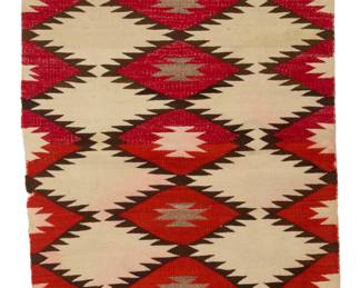 3
A Navajo double saddle blanket
Early 20th century, Diné
Woven in red, cream, natural grey, and dark brown wool with three columns of stacked serrated diamonds
54" H x 30" W
Estimate: $500 - $700