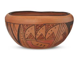 101
Charlene Colleteta (b. 20th century, Hopi-Tewa)
A polychrome pottery bowl, circa 1986
Signed to underside: CMC
The three-color bowl with red and brown banded geometric motifs to body
3.625" H x 6.875" Dia.
Estimate: $100 - $200