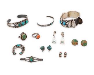 274
A group of Southwest style sterling silver and set stone jewelry
Mid/late 20th century
Most unmarked; coral ring with mid-century Egyptian hallmark
Eleven works comprising a Navajo Diné sterling silver and set turquoise watch cuff with elaborate silver overlay (6.75" inner C x 1.125" H), an early sterling silver two-wire 'heart' cuff with set turquoise and silver overlay (6.5" inner C x 0.75" H), and a Fred Harvey style narrow cuff with stamp work and set turquoise cabochon (6" inner C), as well as two sterling silver Fred Harvey-style brooches with set turquoise, one a bar pin with stamp work, and one a three-wire naja pin (2.125" W & 1.25" H), two rings, one a set coral ring, and one an early set turquoise ring with wire edging ( sizes: 7.25 & 6.75), and four pairs of earrings in various styles including set turquoise, coral, and a pair of mosaic inlay 'Peyote bird' earrings
15 pieces
154.8 grams gross
Estimate: $400 - $600