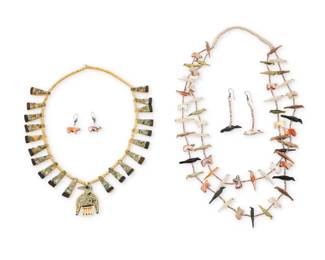 213
A group of Southwest Pueblo jewelry
Mid/late 20th century
Four works comprising a Kewa Santo Domingo Pueblo depression-era 'battery bird' necklace with chipped turquoise inlay and carved bone beads (20.5" L x 2" H), together with a Zuni Pueblo two-strand fetish necklace featuring carved stone and shell bird and bear figures and heishi shell spacers (27" L), and two pairs of similar-style earrings (3" H & 1.5" H)
6 pieces
164.0 grams gross
Estimate: $500 - $700