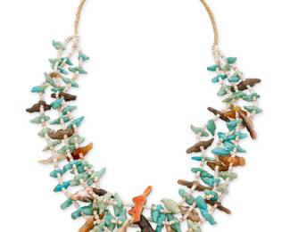 124
A Southwest Pueblo Zuni style carved stone fetish necklace
Mid-20th century
A three-strand necklace with multiple graduated carved turquoise, abalone, and agate animals in the form of birds, fox, and bear, with heishi shell spacers and a traditional wrapped neck cord
28" L
161.8 grams gross
Estimate: $500 - $700