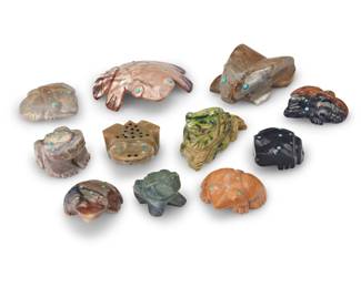 239
A group of Southwest Pueblo carved stone frog fetish figures
Mid/late 20th century, mostly Zuni Pueblo
Seven labeled for artist
Comprising eleven frog fetish figures in various stones including onyx, various grey stones, shell, and antler, in various sizes, including seven figures by Zuni artists including Georgette Quam, Andrew Quam, Tyler Quam, Todd Poncho, and Patricia Wayne, as well as four further frog figures, many with inset turquoise accents
11 pieces
Largest: 0.375" H x 2.5" W x 2.5" D; Smallest: 0.75" H x 0.875" W x 1" D
Estimate: $200 - $400