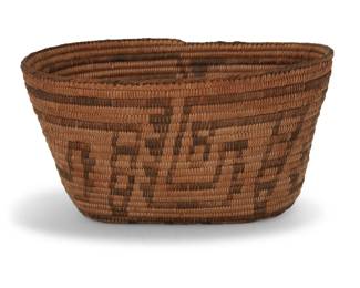 155
A Pima oval basket
Early/mid-20th century, Akimel O'odham; Southwest United States
A tall coiled basket with interlocked meandering motifs and stepped herringbone pattern to base, with a bundle foundation and braided rim
6.25" H x 11.5" W x 8.75" D
Estimate: $100 - $200