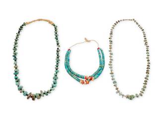 214
A group of Southwest style shell and turquoise necklaces
Mid/late 20th century
Three works comprising a chunky necklace with graduated turquoise nuggets and black bead spacers, a necklace with smaller turquoise nuggets and heishi shell spacers, and a double strand of jaclas with turquoise, coral, and spiny oyster shell beads
3 pieces
Each necklace: 28" L; jaclas: 17" L
254.6 grams gross
Estimate: $700 - $900