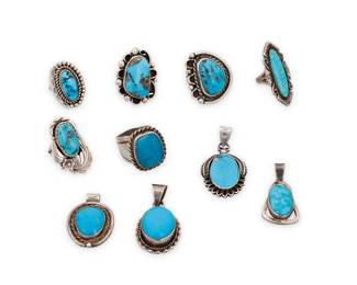 246
A group of Southwest silver and turquoise jewelry
Mid/late 20th century
Four marked for sterling; three further marked for maker: JD / [for Bell Trading Post] / [illegible]
Comprising four silver and set single turquoise pendants as well as six similar design rings with set single turquoise, each in various designs including silver overlay, feather motifs, and twisted wire edging
10 pieces
Pendants: 2" H to 1.375: H; Ring sizes: 8.5 to 6.5
110.5 grams gross
Estimate: $400 - $600