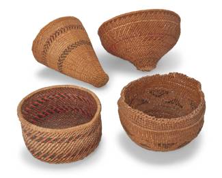 235
A group of Native American baskets
Early/mid-20th century
Four polychrome twined baskets comprising a large round basket with conical base and geometric banding (6.5" H x 11.5" Dia.), a narrow conical gap-stitched basket with two gap-stitched contrast bands, one imbricated (9.75" H x 8.5" W x 7.5" D), a basketry bowl with coiled rim and diagonal colored banding (4.25" H x 7.5" Dia.), and a pliable berry-style basketry bowl with floating triangles and striped banding, with wrapped rod detail near top edge (5.25" H x 8" Dia.)
4 pieces
Estimate: $300 - $500