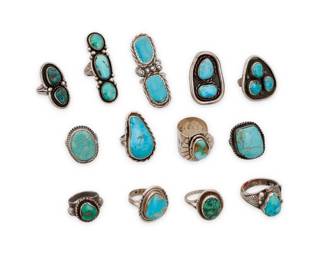 262
A group of Southwest style silver and turquoise rings
Mid/late 20th century
Four variously marked for sterling and/or for maker: CT / CN / F / Kenza [heart picto, inscribed: Be Free]
Comprising five rings with double or triple set turquoise stones including two with shadowbox style settings, as well as eight rings with single set turquoise in various styles including twisted wire edging, silver feather overlay, and a wide silver band with set turquoise, and serrated silver sun ray edging
13 pieces
Ring sizes: 8.75 to 5.5
121.6 grams gross
Estimate: $400 - $600