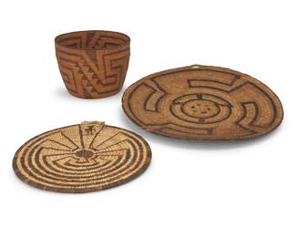 156
A group of Pima baskets
Early/mid-20th century, Akimel O'odham; Southwest United States
Comprising a coiled cylindrical basket with overall stepped sawtooth meandering motif (6" H x 8.5" Dia.), as well as a large polychrome coiled tray with hooked swirl motif (16.5" Dia.) and a small 'Man in the Maze' coiled basketry tray (11.75" Dia.)
3 pieces
Estimate: $200 - $400