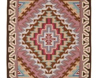 48
A Navajo Burntwater textile
Late 20th century, Diné, Esther Vanwinkle
Woven in multicolor wool, with a central elaborate concentric diamond with hooked and sawtooth edges, with an elaborate stepped border
48.5" H x 34.25" W
Estimate: $400 - $600