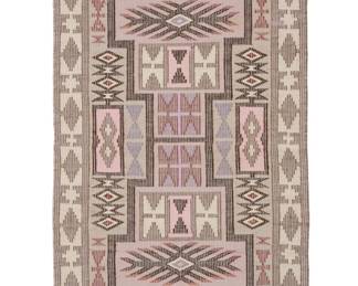 50
A Navajo raised outline Storm Pattern textile
Late 20th century, Diné, Sally Begay (b. 1956)
Woven in pale multicolor, grey, and brown wool, with a storm pattern and waterbug motifs within a stacked diamond border
54.5" H x 32" W
Estimate: $500 - $700