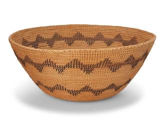 140
A large Yokuts basketry bowl
Early/mid-20th century; Central California
A coiled tapered gap-stitch basket with two zigzag sawtooth bands
5.75" H x14" Dia.
Estimate: $300 - $500