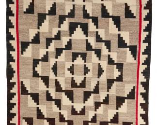 5
A Navajo optical rug
Mid/late 20th century, Diné
Woven in red, cream, natural grey, and black wool, with concentric stepped diamonds and a stepped border
127" H x 78.5" W
Estimate: $800 - $1,200