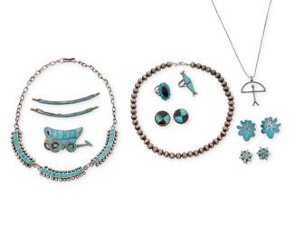 255
A group of Southwest sterling silver and turquoise inlay jewelry
Mid/late 20th century
Unmarked
Ten works comprising three necklaces including a Zuni Pueblo-style chain choker necklace with three turquoise inlay and silver ball curved links (18.5" L), a choker necklace of silver pearls (17" L), and a small Rainbow Guardian pendant necklace (18" L x 1.75" H), as well as a sterling silver articulated dimensional 'covered wagon' brooch with turquoise inlay and moving wheel (1.5" H x 2.625" W), two turquoise inlay rings, one with central onyx inlay (sizes: 8.75 and 6.5), three pairs of earrings, including two Zuni Pueblo-style pairs, each with turquoise inlay in floral motifs, and one with onyx inlay (1.125" H to 0.75" H), and two sterling silver and turquoise inlay hair comb accents (0.25" H x 3.25" W)
14 pieces
150.2 grams gross
Estimate: $500 - $700