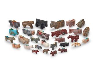 228
A group of Southwest Pueblo carved stone horse fetish figures
Mid/late 20th century, mostly Zuni Pueblo
Nine labeled for artist
A group of carved stone figures, primarily horses, in various sizes and stones and materials including turquoise, pipestone, bone, jet, and other pink and grey hardstones, including nine figures by Zuni artists including Emery Boone, Lucy Cooeyate, Virginia Toombs, Gabriel Burns, and Thelma Sheche
as well as twenty further figures, most with mounted offerings
29 pieces
Largest: 1.5" H x 0.75" W x 2.5" D; Smallest: 0.5" H x 0.25" W x 1" D
Estimate: $200 - $400