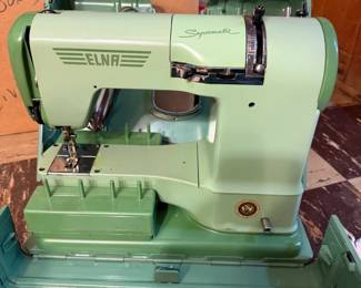 ELNA Sewing Machine,  condition unknown,  makes a great paperweight. 