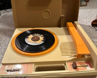 Vintage children’s record player in case