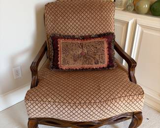 A pair of upholstered and wood vintage side chairs