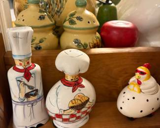 Chef inspired salt and pepper shakers but look at the chicken driving the egg!! It is a salt and pepper shaker too!