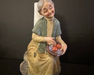 Vintage Napcoware Porcelain Figurine of an Elderly Woman with Fruit Basket
