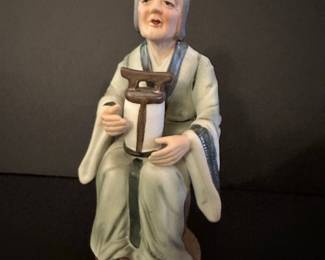Vintage Napcoware Porcelain Figurine of an Elderly Woman Holding a Lantern