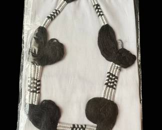 Handmade Beaded Necklace with Black Wool Heart Pendants