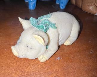 Sleeping Pig Figurine with Green Bow