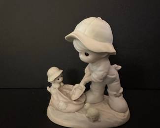 Precious Moments "Nothing Can Dampen The Spirit Of Caring" Figurine