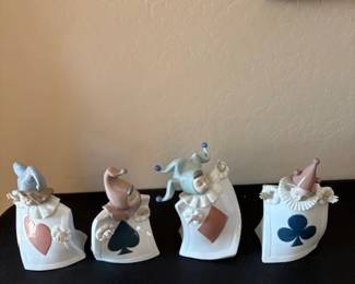 Nao by Lladro artist from Spain. Finest Porcelain and very very collectible- set of 4 for each suit - each handcrafted- These are rare vintage items and each one is in excellent shape- no cracks or chips