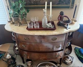 Buffet table/ storage. Silverplated serving ware