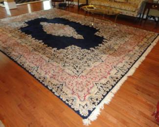 Handmade Wool Rug measures 12 x 16