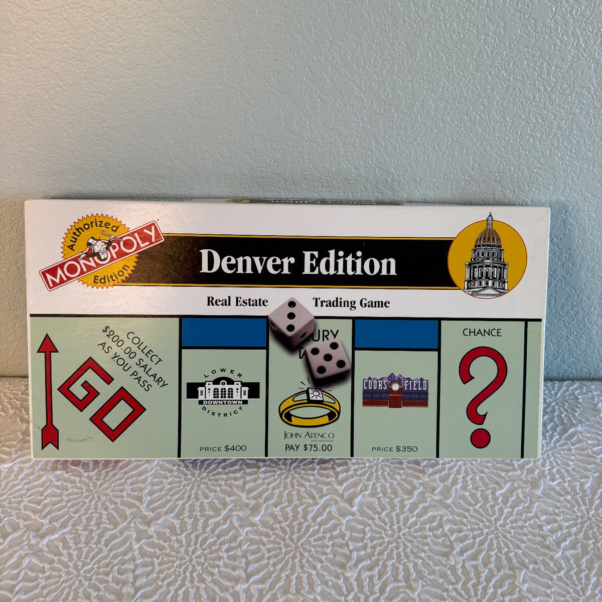This is a Monopoly Denver Edition real estate trading game produced by USAopoly. The game features local Denver landmarks and properties, including Lower Downtown and Coors Field. It includes all standard Monopoly components such as dice, property cards, tokens, houses, and hotels, organized in a compartmentalized box. Suitable for 2-8 players ages 8 and up, this edition offers a unique twist on the classic Monopoly game with a Denver city theme, authorized and officially licensed by Hasbro.
Please defer to photos for condition. 15% Buyer's Premium. We only ship with USPS Priority Mail Flat Rate Shipping. Items with value over $100 shipping insurance must also be charged to you to protect your purchase. Please contact us regarding shipping in advance if you have any questions. 