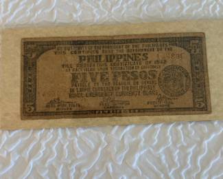 This 1945 emergency currency note from the Philippines features a 5 pesos denomination issued by the Bohol Emergency Currency Board during World War II. The note is a rare collectible that was authorized by the President of the Philippines at the time and designed for use as lawful currency under emergency conditions. A must-have for collectors of historical World War II and Philippine memorabilia.
Please defer to photos for condition. 15% Buyer's Premium. We only ship with USPS Priority Mail Flat Rate Shipping. Items with value over $100 shipping insurance must also be charged to you to protect your purchase. Please contact us regarding shipping in advance if you have any questions.
Alternative pick-up times are very limited. Please consider pick-up hours when bidding. Items that are not picked-up and shipping arrangements have not been made/paid for within 7 days will be considered abandoned.