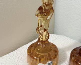 Lot #58 Art Deco “Bashful Charlotte” Amber Glass Flower Frog Pair – Coordinating Yet Different Figural Design apx 6" Tall