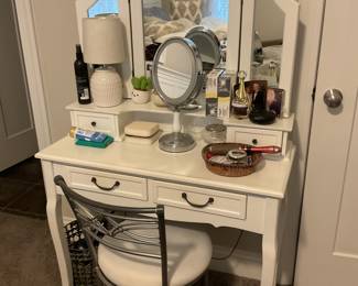Vanity with mirror. Chair sold separately. 