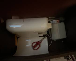 Sewing machine with case 