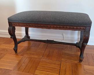 Antique bench with grey felt fabric