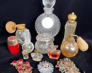 Perfume Bottles With 3 Vintage Brooches
