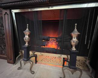 Working faux fire place- part of our unique vintage entertainment center