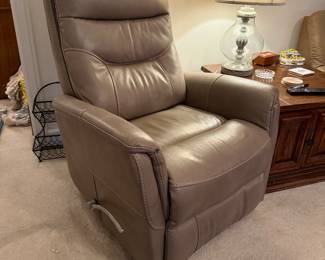 	#17	Leather Swivel Rocker Recliner	 $125.00 				
