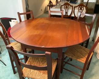 Round Wooden Dining Table with WovenSeat Chairs
