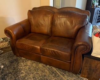 All leather loveseat -$750 