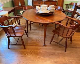 1958/1959 Temple Stuart solid cherry dining table with lazy Susan and 2 additional leaves (round to oval shape) with 6 Temple Stuart armchairs.  Chairs stamped 1959, table leaf stamped 1958