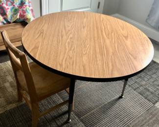 Round Adjustable Height Kids Table is 36 inches round x 22 inches Tall $85 + Chair $10 Located Upstairs.