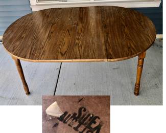 PRE-SALE ITEM - Outside Oak wood table, oval is 65 inches long w 2 leaves each 11.5 inch x 42 wide x 30 Tall $25
