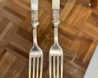 20 Landers Frary and Clark pearl handle and solid sterling fork. 