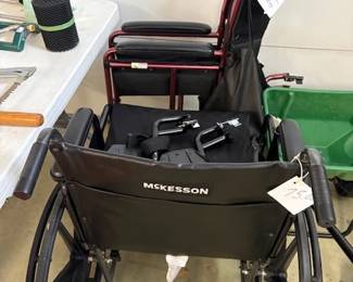 Two Wheel Chairs -- One large and one "Slim Line"