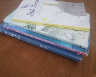 The Little Prince, The Family Under the Bridge, The X'ed-Out X-Ray, and Planet X