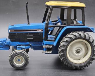 Vtg. Blue ERTL Ford 8249 Die Cast Tractor Model