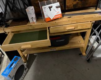 Rolling wooden work bench with drawers $85