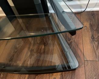 $80 - 4 Shelf Glass TV Stand/Entertainment Center